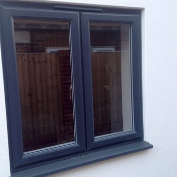 Anthracite grey uPVC casement window residential installation
