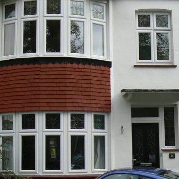 Bay and casement style uPVC windows in white