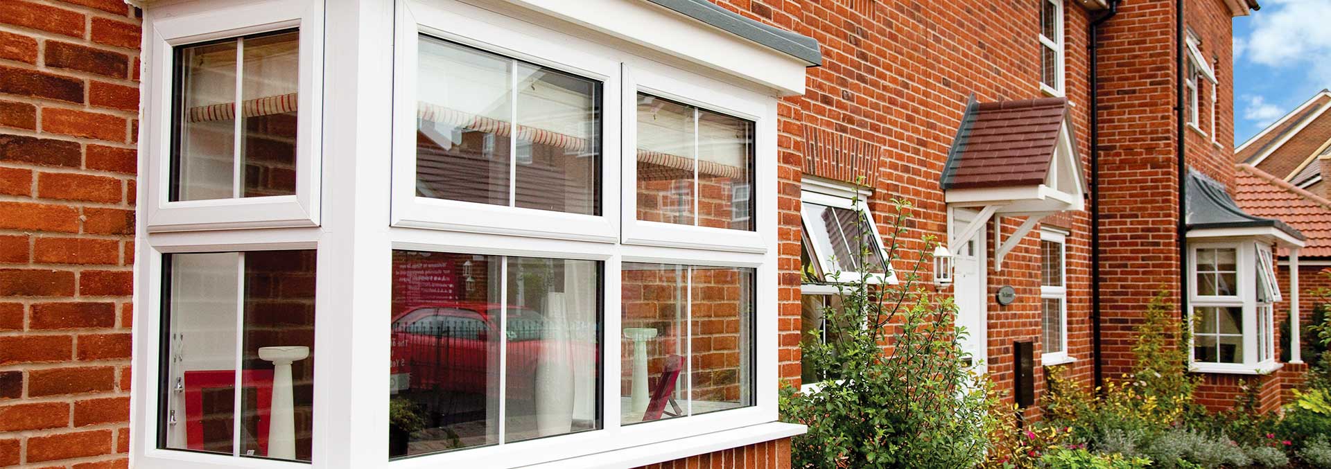 Windows in white uPVC in bay configuration which utilise double glazing