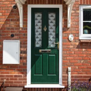 Front entrance door with glazed panels in dark green