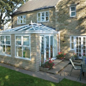 energy efficient orangery extension with glass roof and french doors
