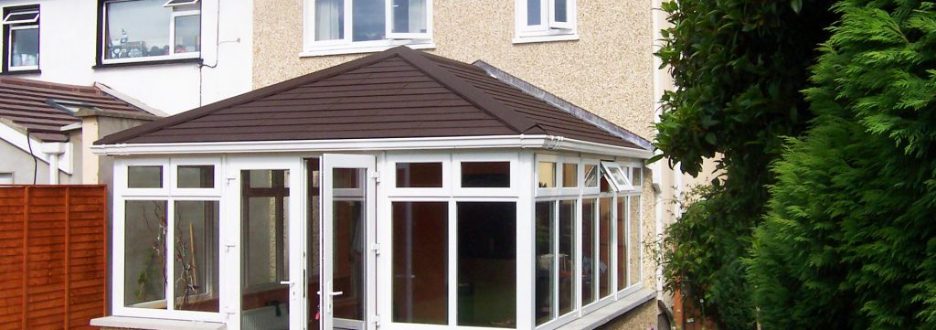 Tiled conservatory roof which replaced old polycarbonate conservatory roof