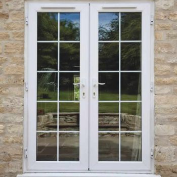 White uPVC double french door with astragal bars